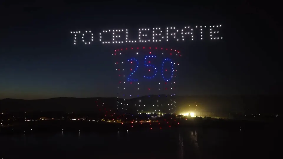 “To Celebrate 250” written in drones