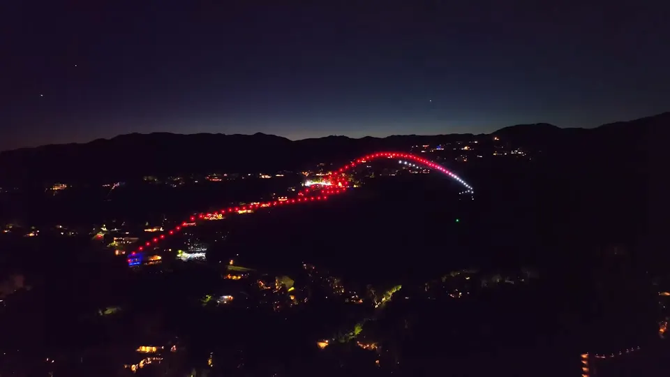 A red sports car in drones above Bel Air